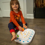 RollAgain Maze with boy playing