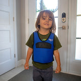 Child wearing blue and black weighted vest